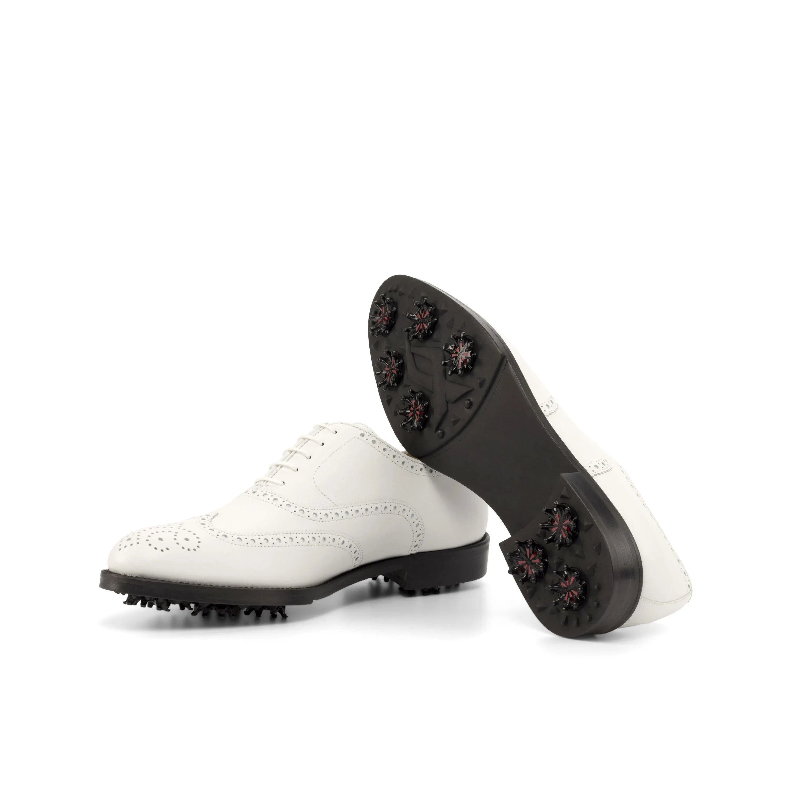 White Stan Full Brogue golf shoes featuring spiked soles for superior grip and style