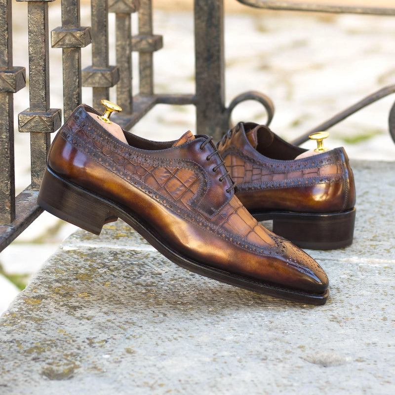 Brown leather dress shoes, Stanley Patina Longwing Blucher II, featuring a classic long wingtip design