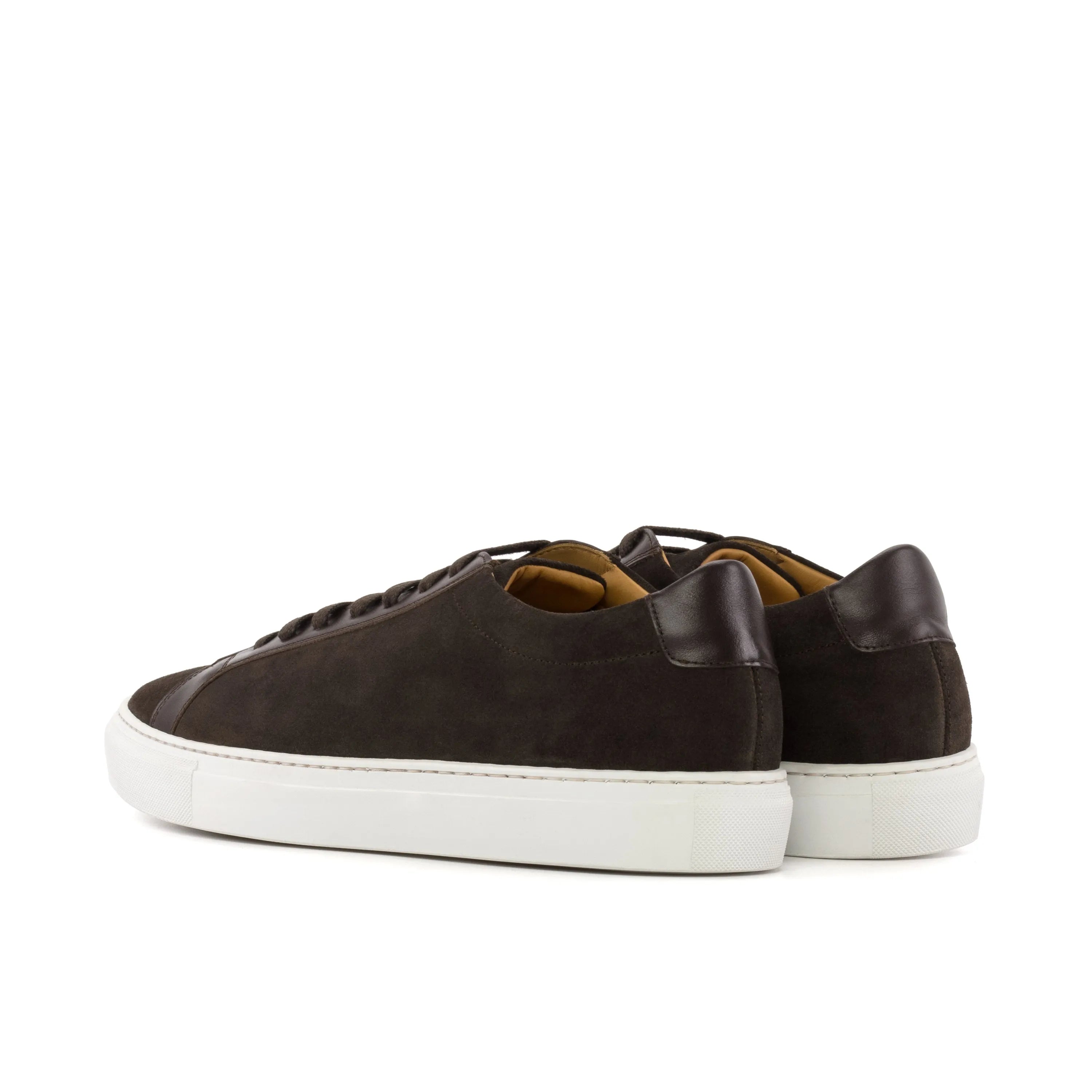 Brown leather sneakers named Sterling Low Kick Sneaker II featuring a dark brown design