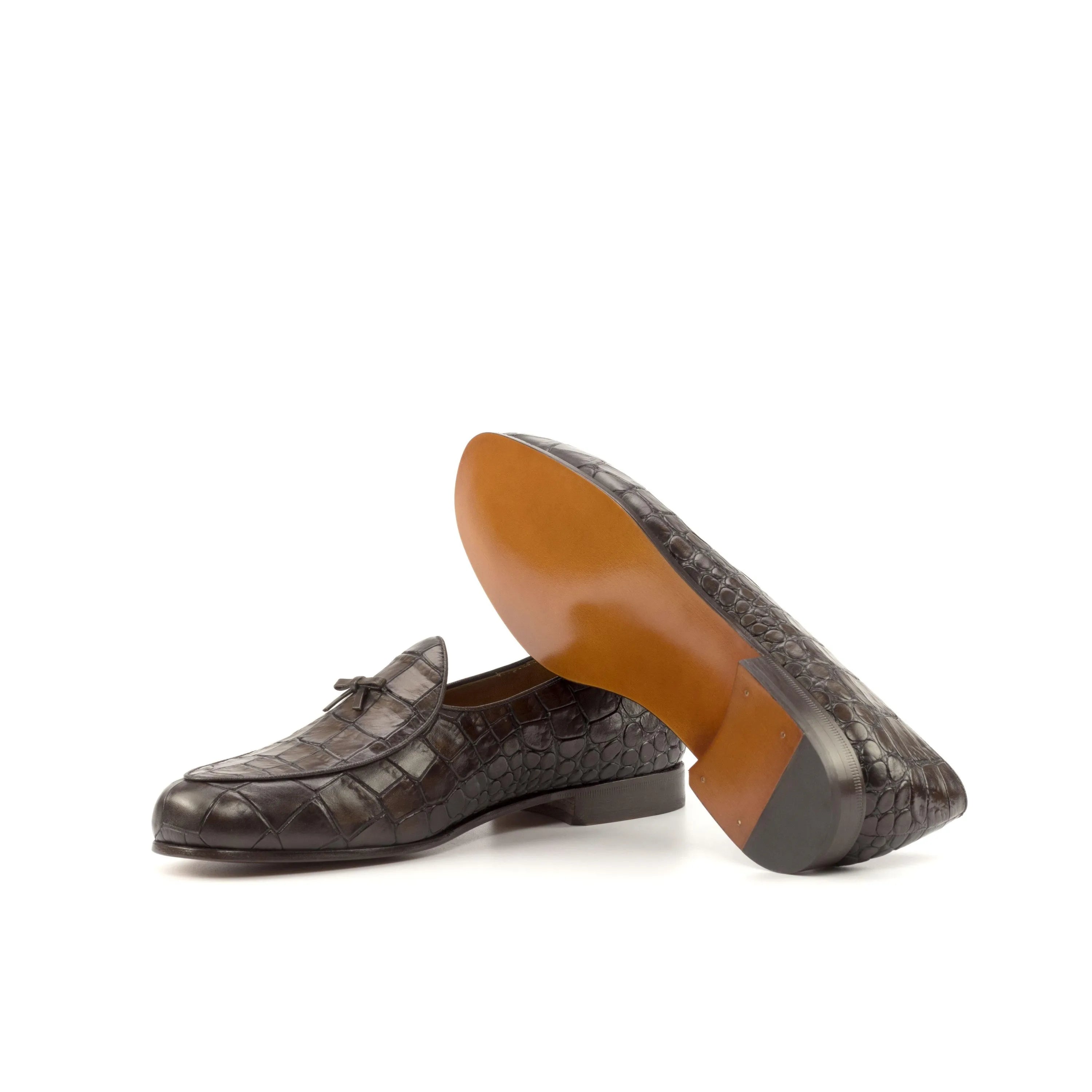 Brown crocodile-patterned leather loafers in St. John’s Belgian Slipper design