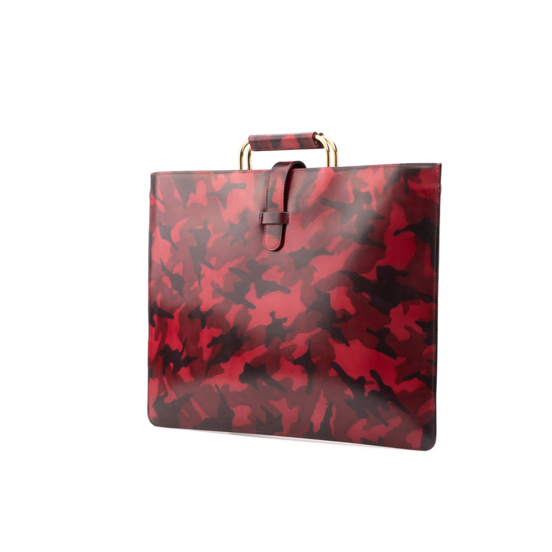 Red and black camouflage briefcase showcasing the unique savoir-faire of Sunil Satchel Patina