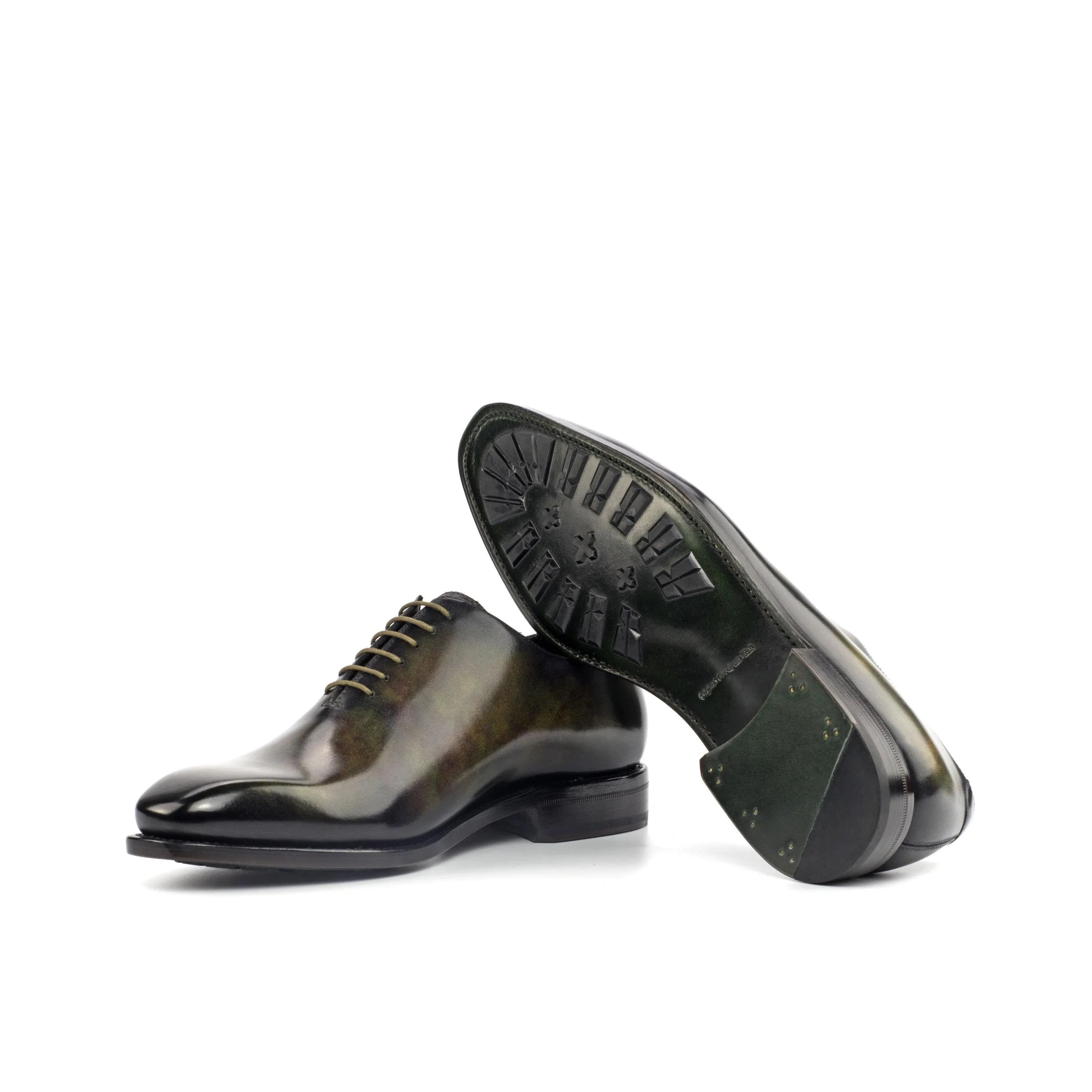 Pair of green leather dress shoes T5 Whole Cut Patina with a rich patina finish