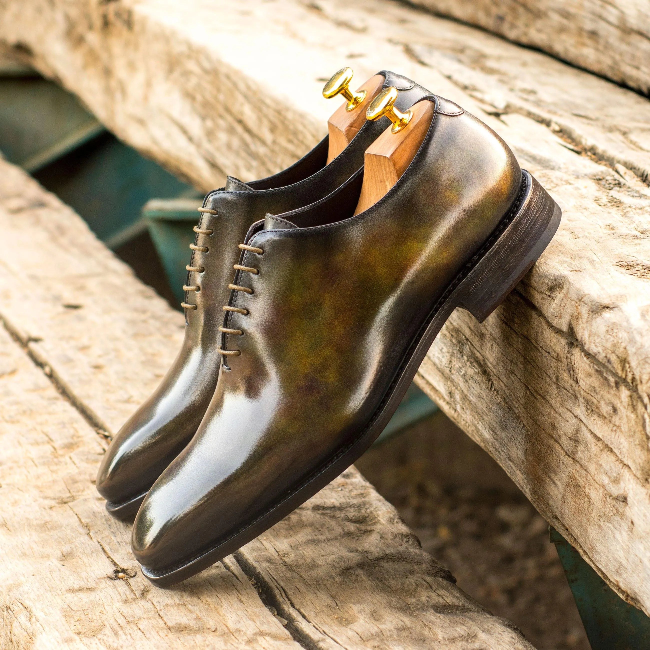 Polished leather dress shoes from the T5 Whole Cut Patina collection showcasing elegance
