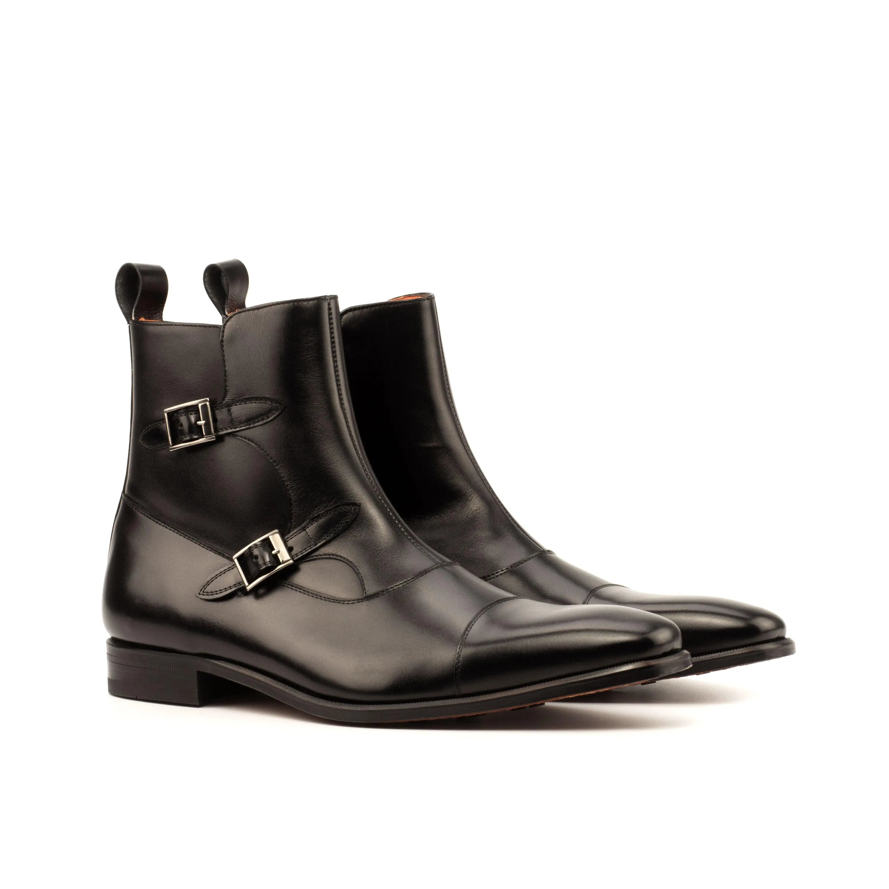 Pair of black leather monk strap T90 Octavian Boots II showcasing elegance and style