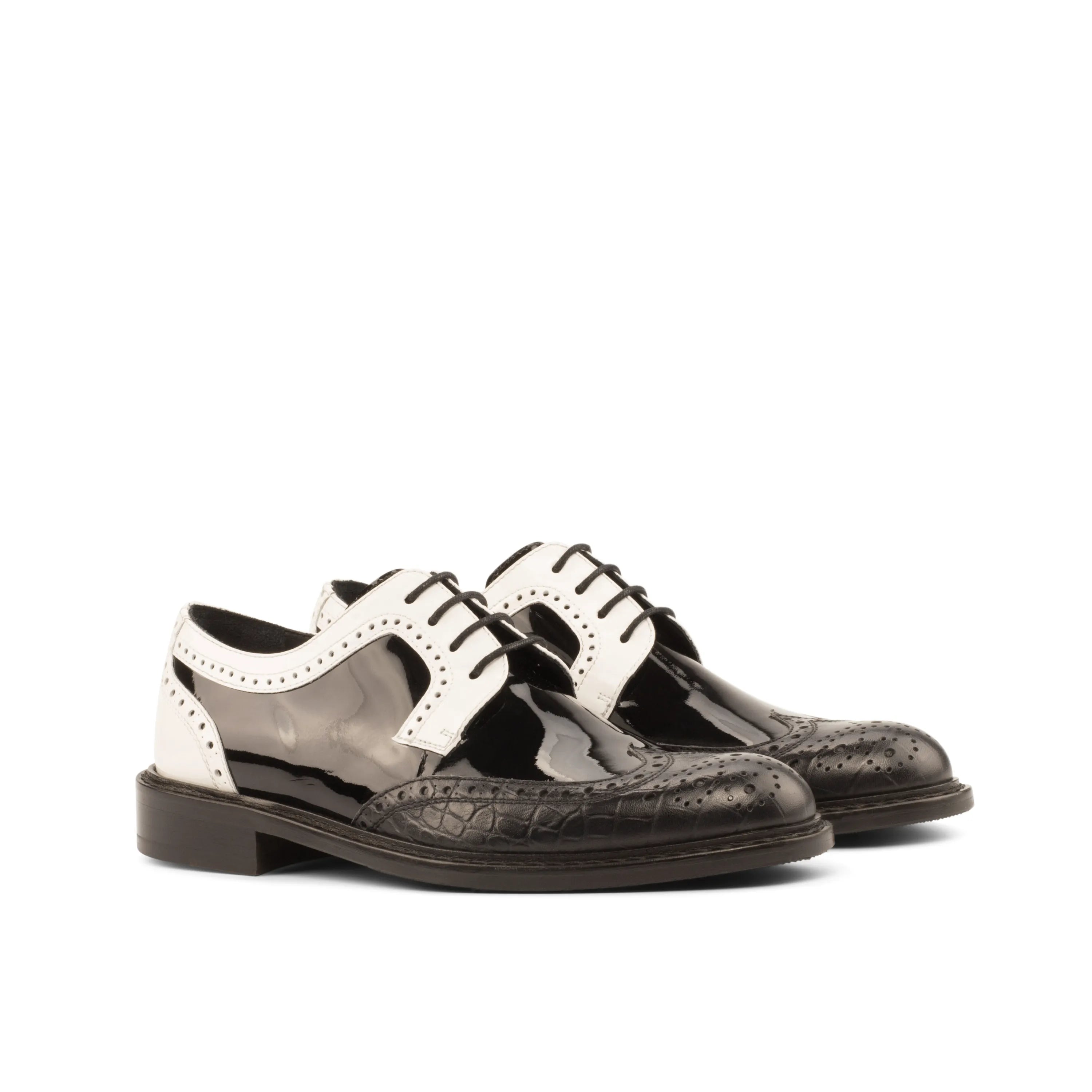 Black and white Tamina Ladies Derby Wingtip shoes, showcasing a classic wingtip blucher design