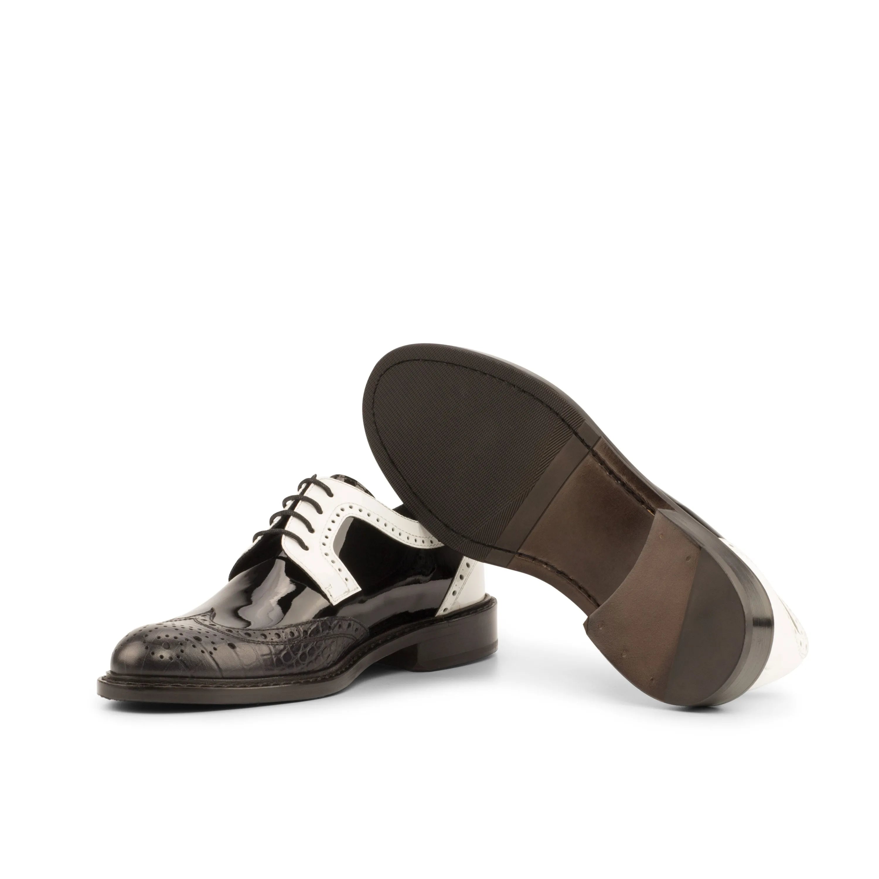 Black and white Tamina Ladies Derby Wingtip shoes featuring classic wingtip design
