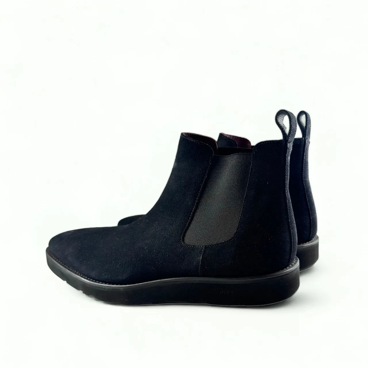 Black suede Termin Chelsea Boot II showcasing elegant design and durability
