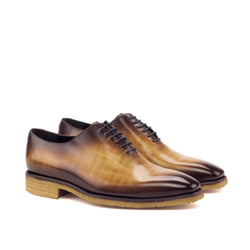 Brown leather dress shoes, Tesla Wholecut Patina II, showcasing elegant wholecut design