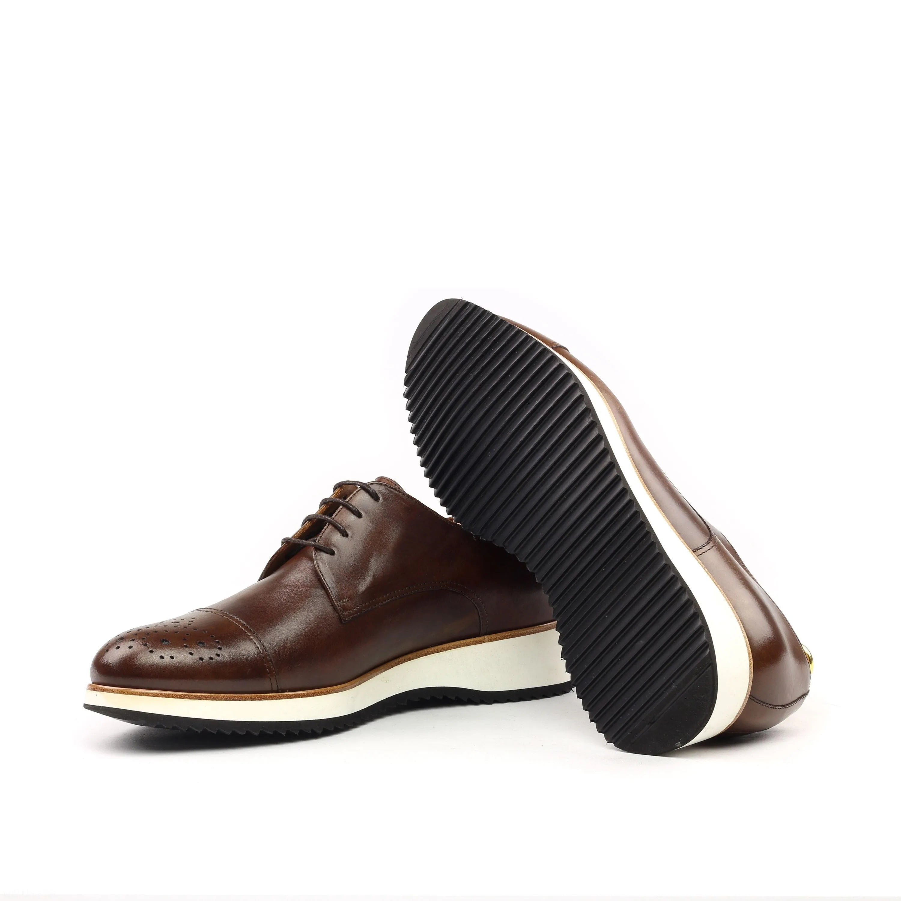 Brown leather Testino Derby shoes featuring a stylish white sole and derby split toe