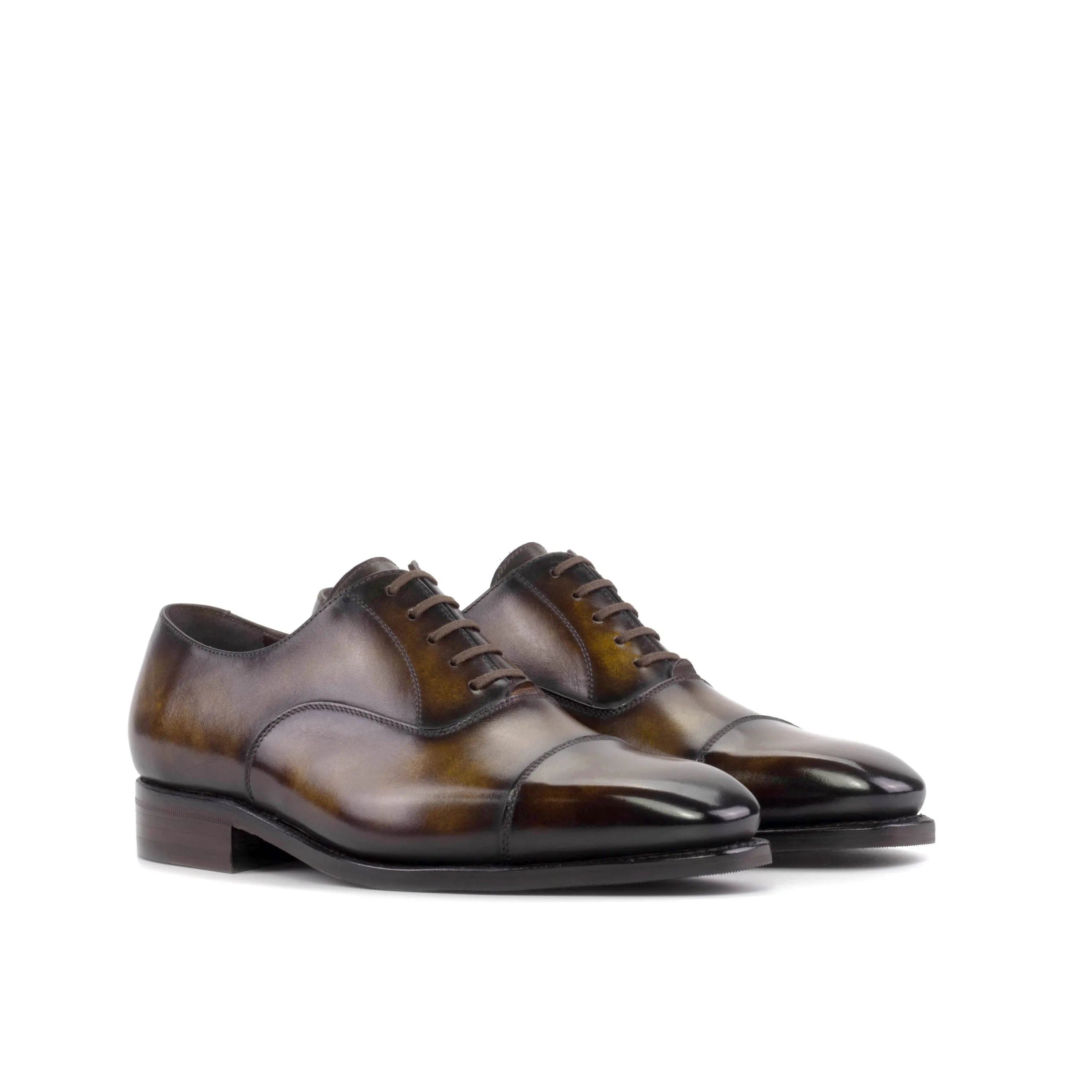 Brown leather Thundro Patina Oxford shoes showcasing elegant craftsmanship and style