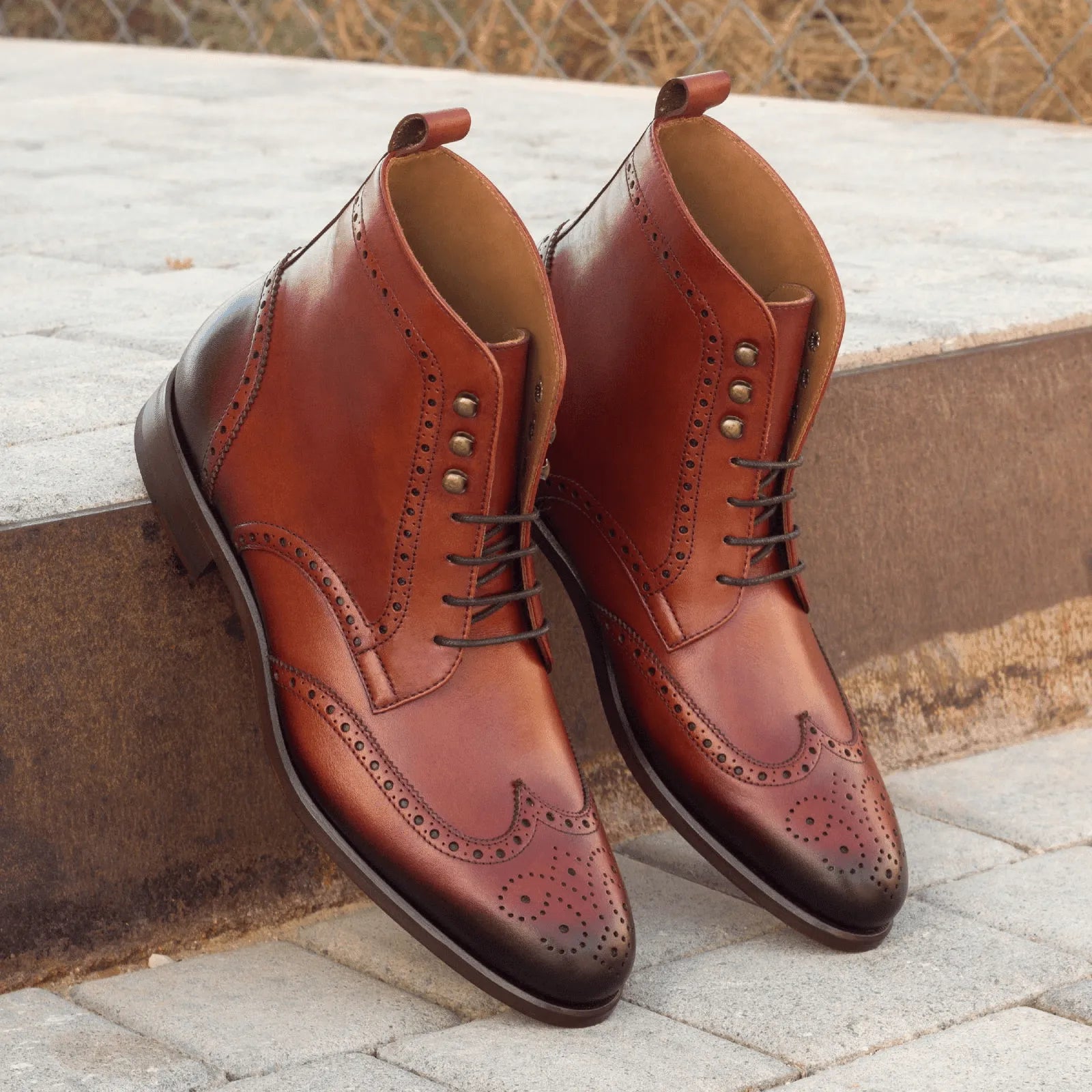 Pair of brown leather wingtip boots, Timon Military Brogue Boots II for stylish versatility