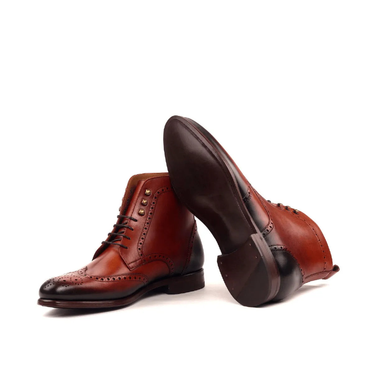 Brown leather wingtip boots displayed as Timon Military Brogue Boots for stylish footwear