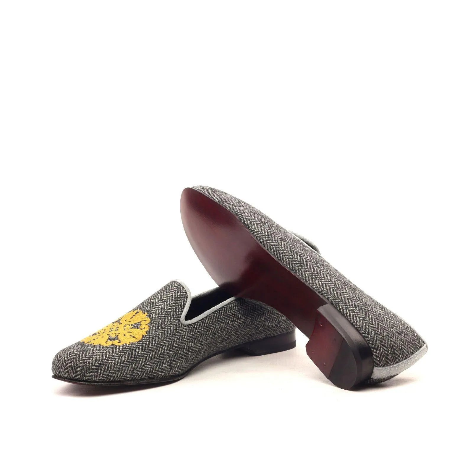 Gray herringbone loafers with gold emblem from Tina Womens Audrey Slipper collection