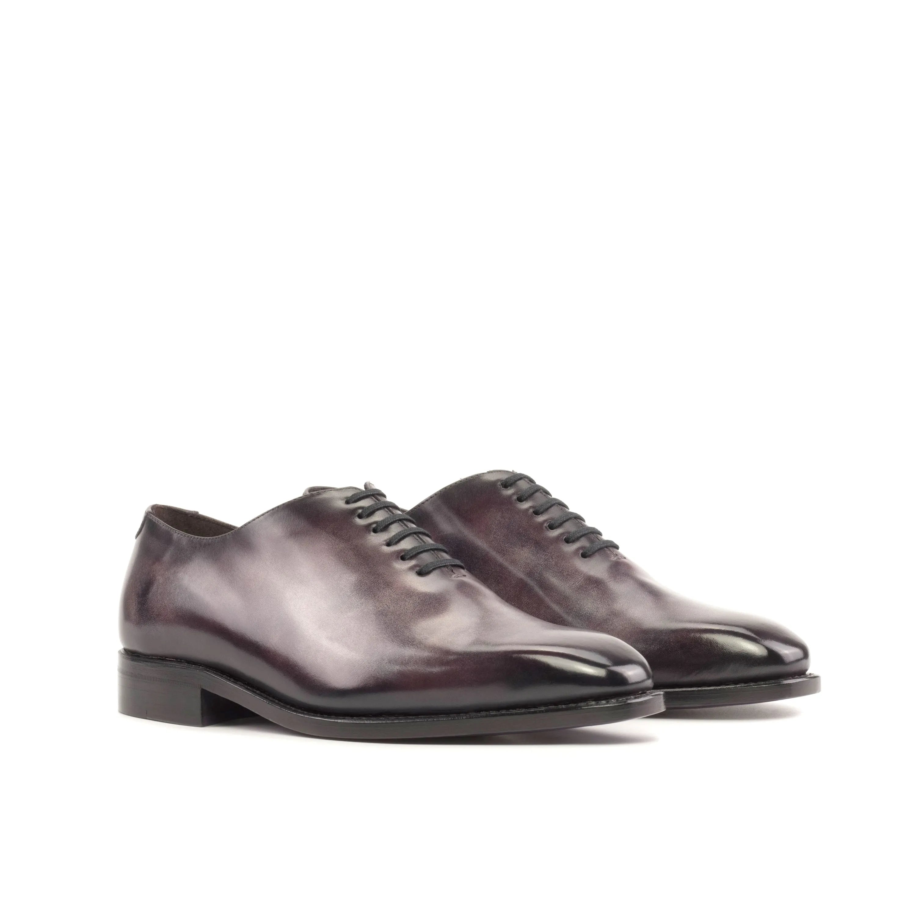 Polished leather Tinzi Patina Wholecut shoes showcasing elegant craftsmanship and style