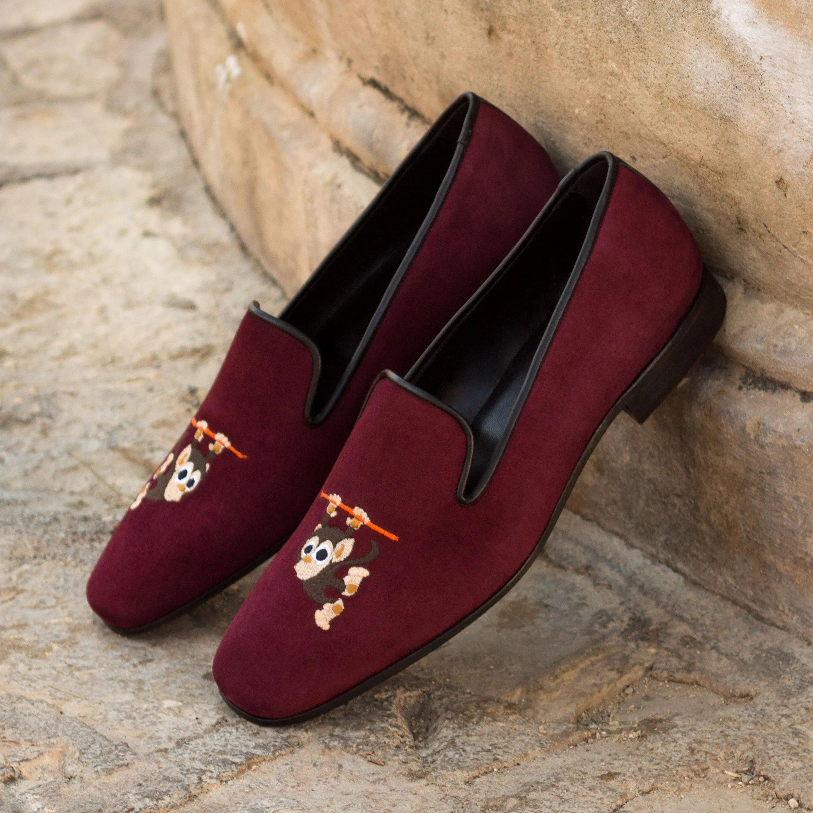 Burgundy velvet Tito Drake slipon loafers featuring monkey embroidery design