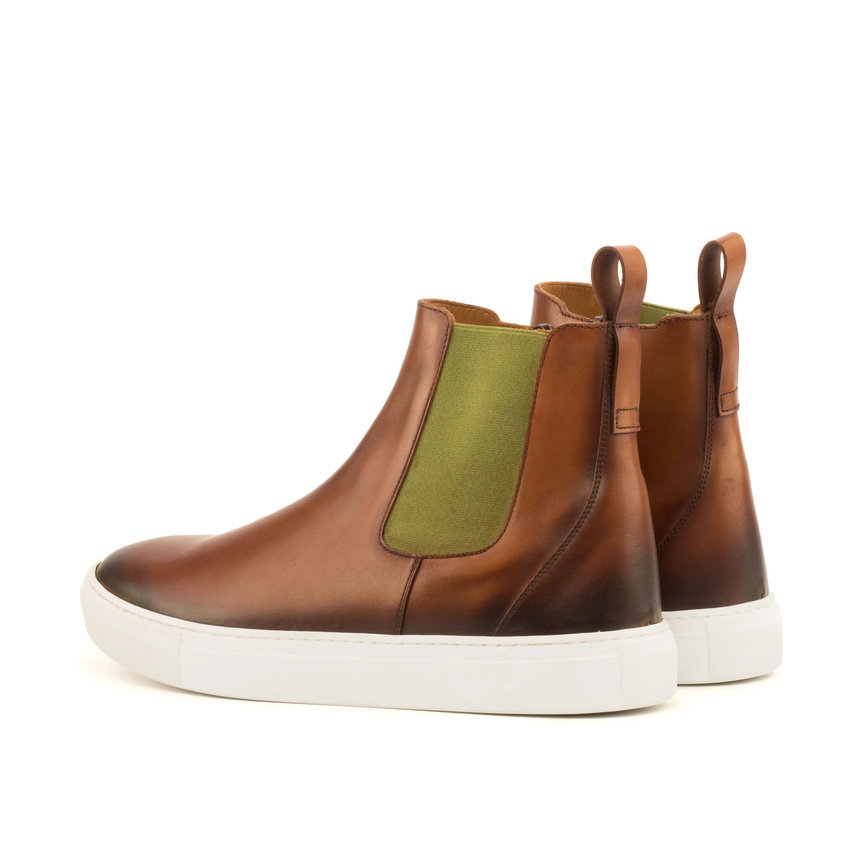 Brown leather TR99 Chelsea sneaker boots with stylish white soles for modern elegance