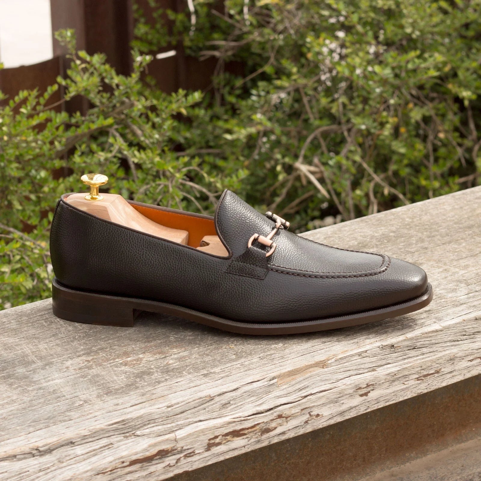 Classic Trilo Loafers II: black painted calf loafer with gold buckle and leather sole