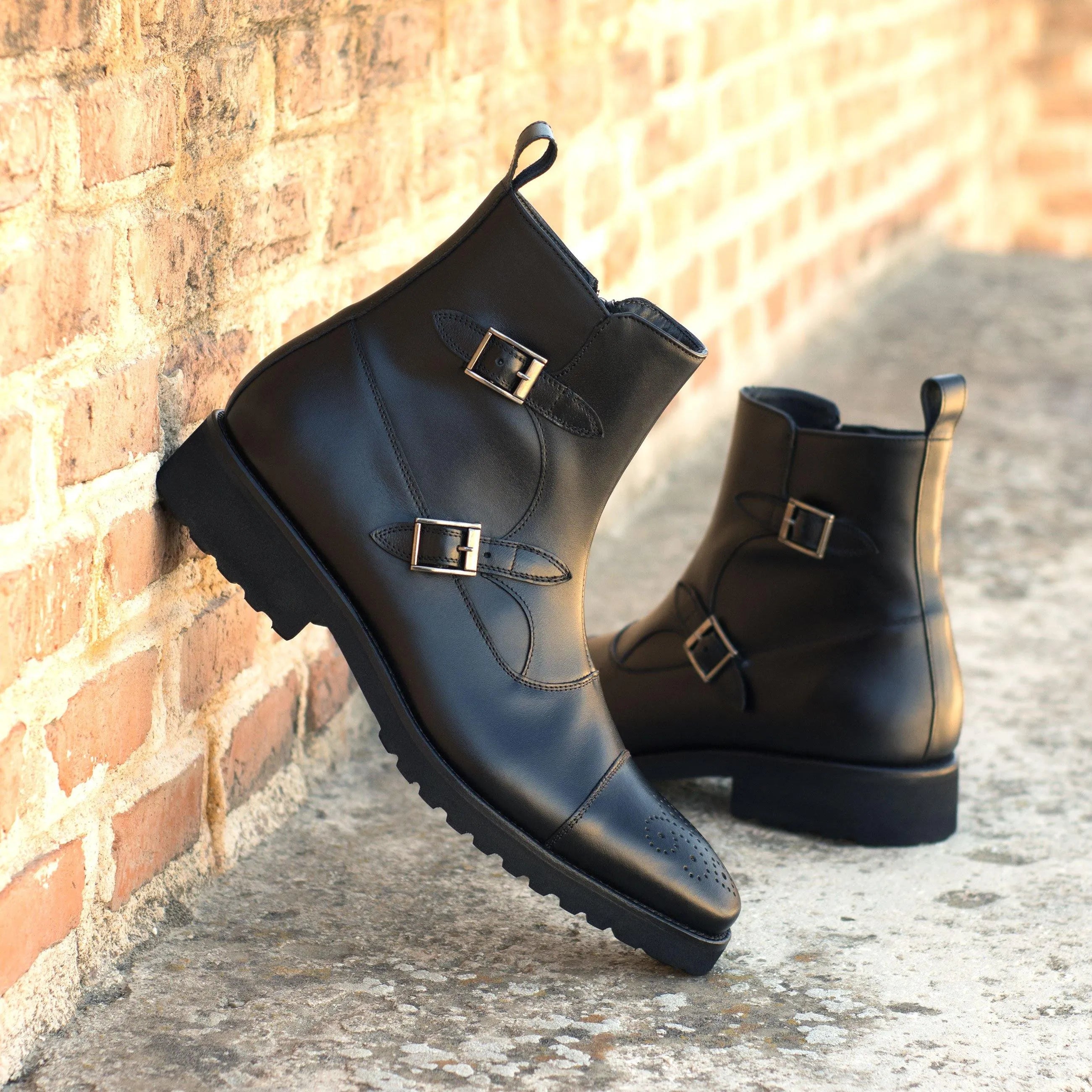 Black leather monk strap Tulum Octavian Boots showcasing elegant design and craftsmanship