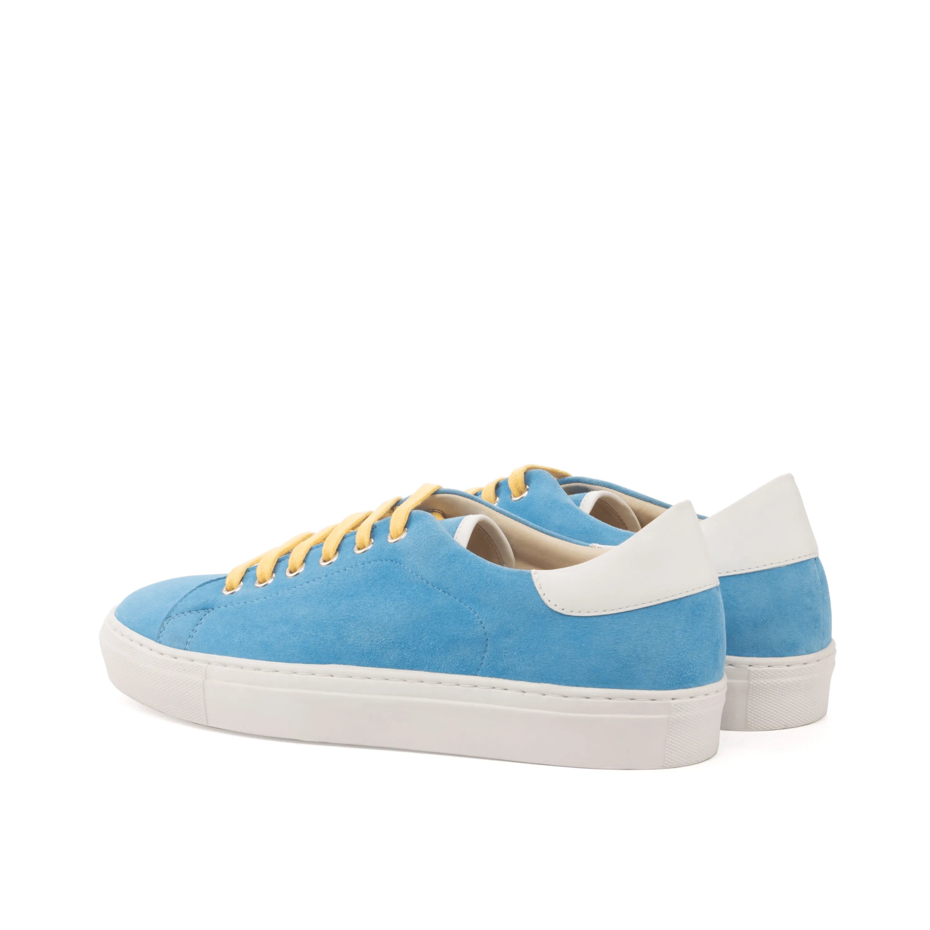Blue suede sneakers from the Usainit Trainer Sneaker collection, offering style and comfort