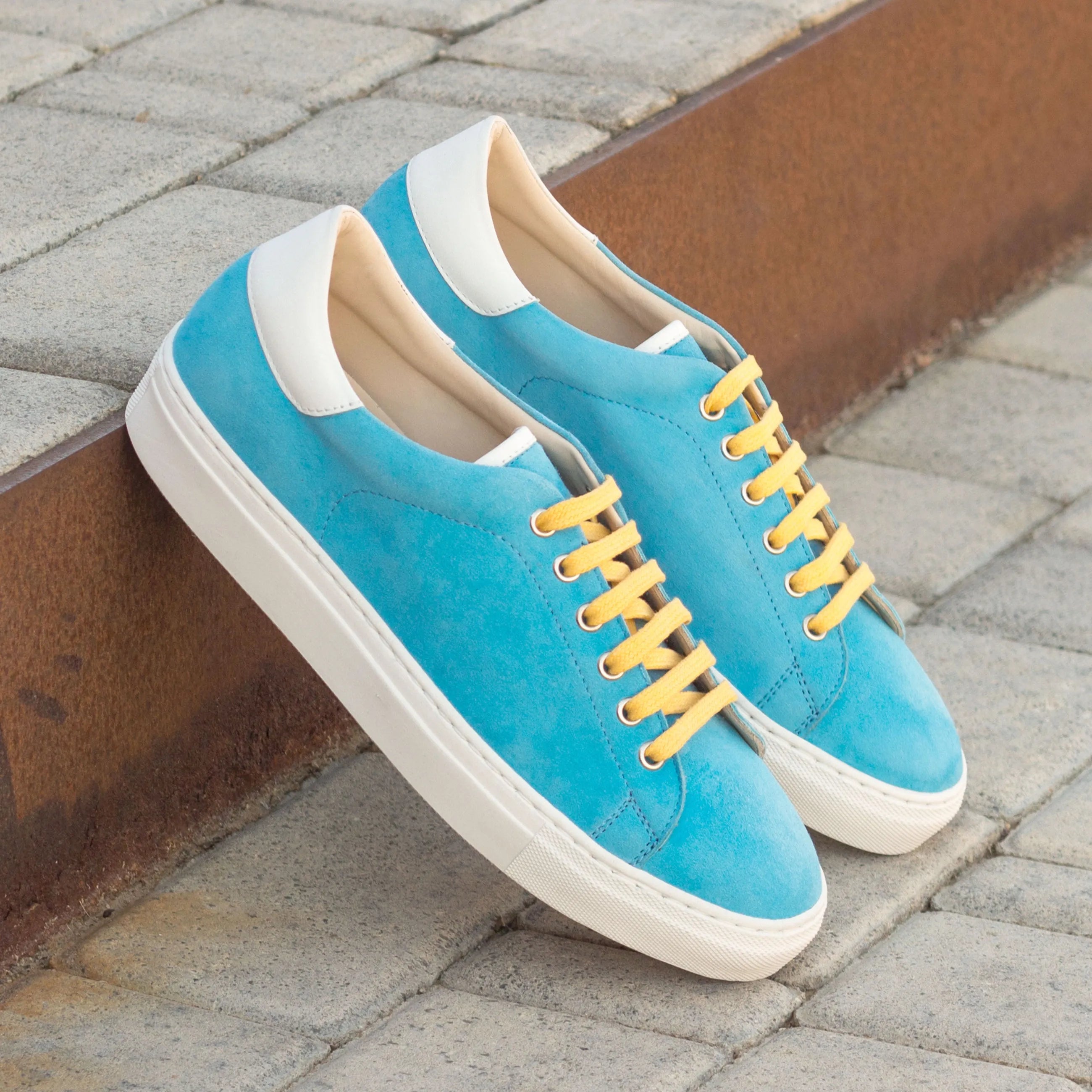 Turquoise suede Usainit Trainer Sneakers with vibrant yellow laces for stylish comfort