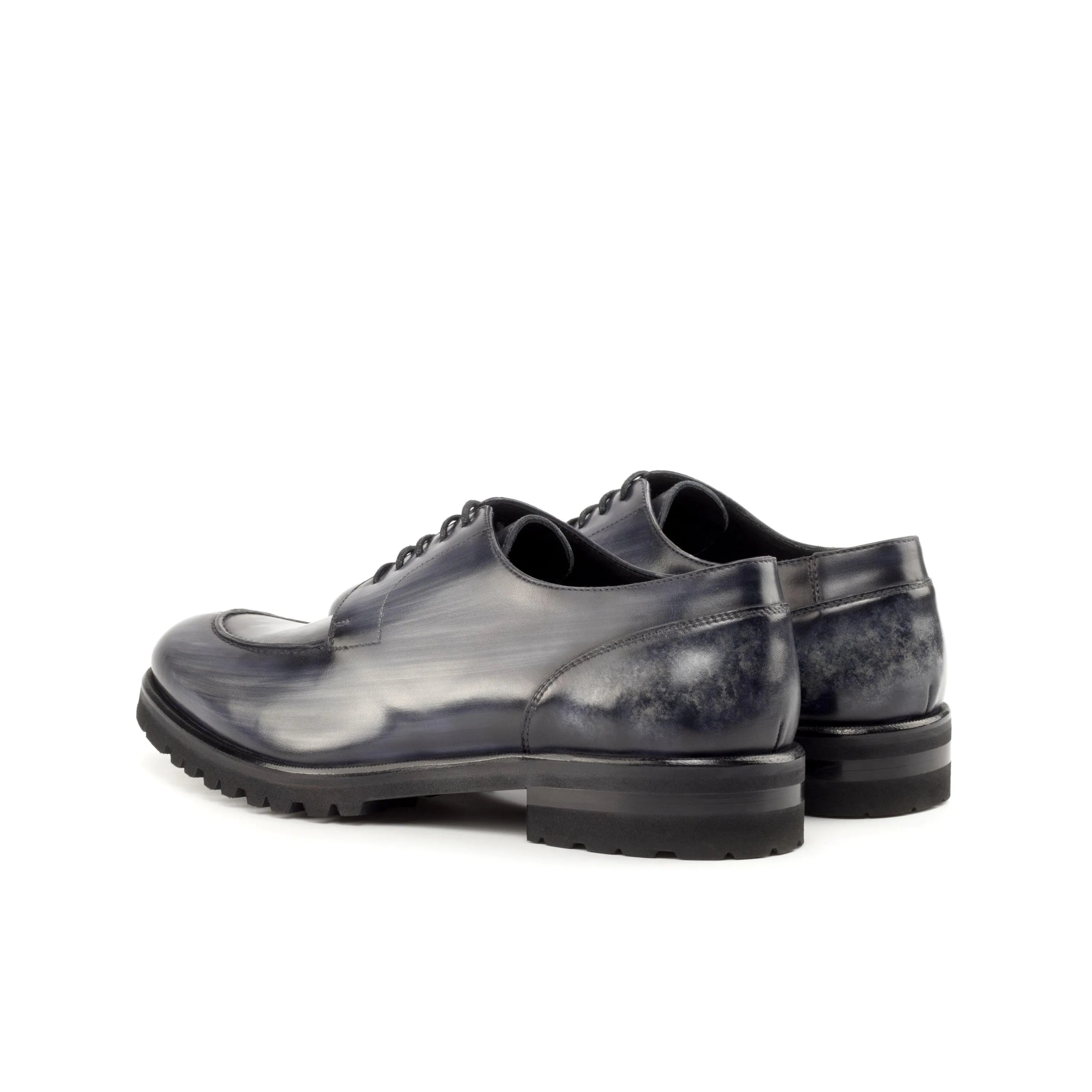 Gray leather Vega Derby Split Toe Patina shoes showcasing elegant craftsmanship