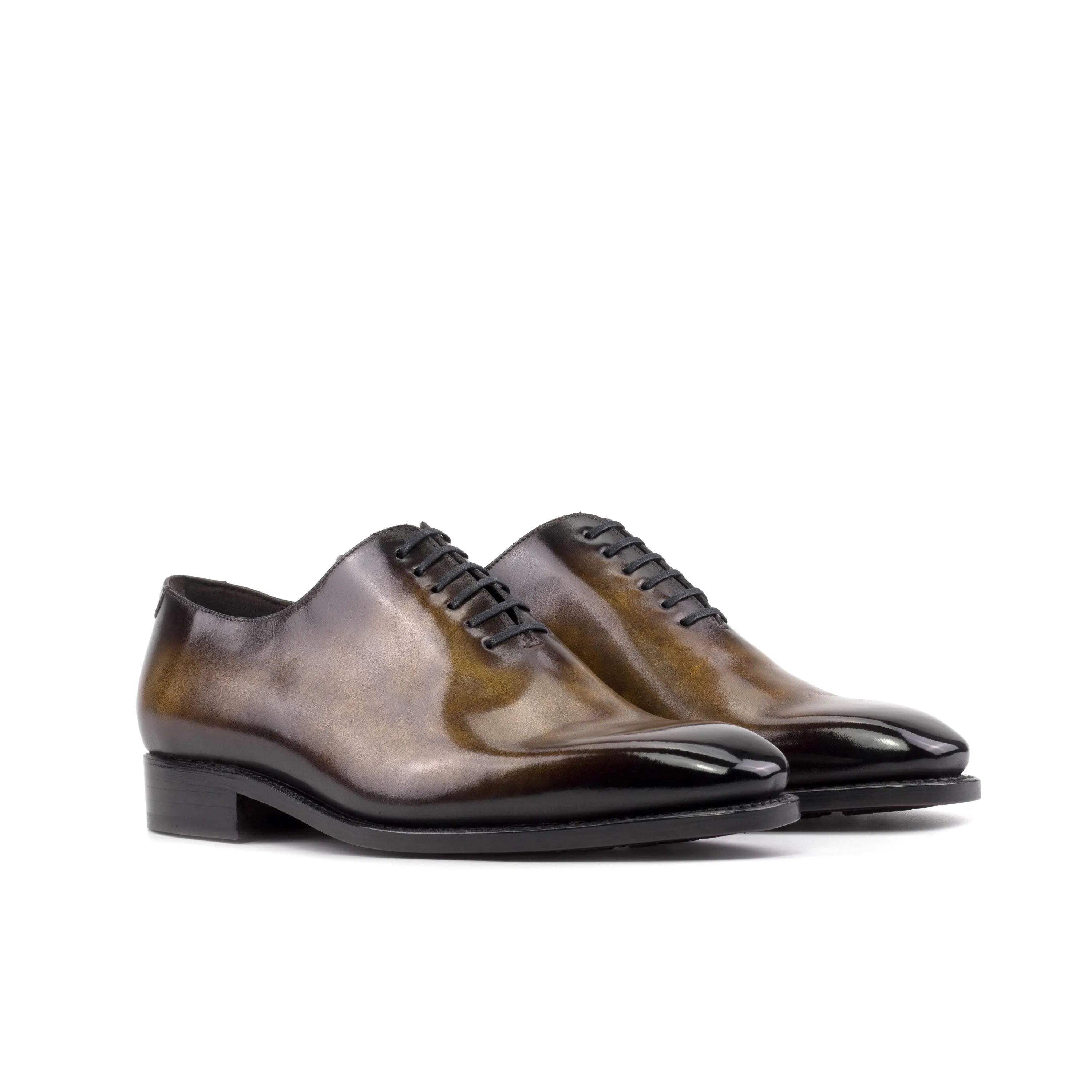 Pair of brown leather Veritas Patina Wholecut shoes for stylish formal wear