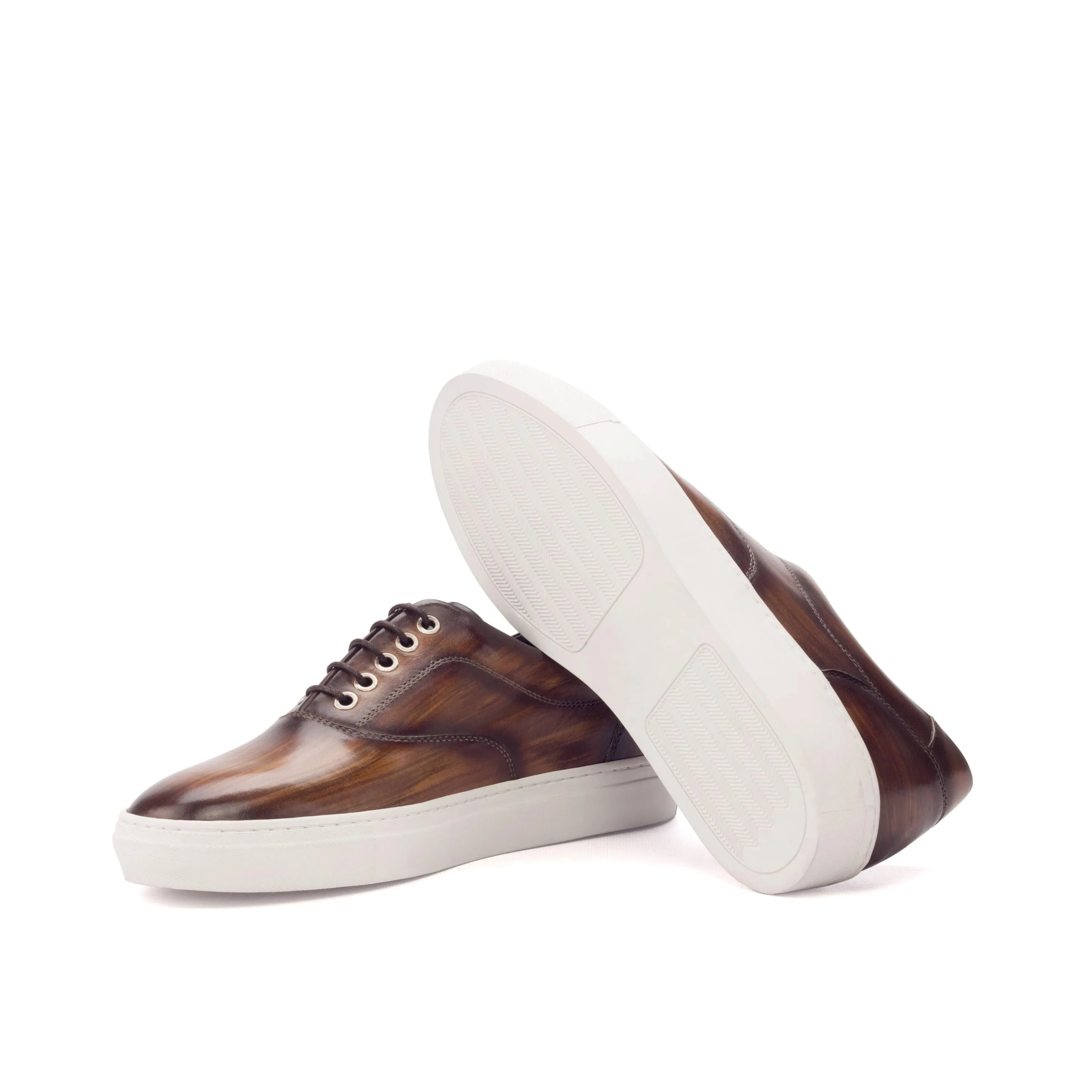 Brown leather Sider Patina Sneakers with white soles, featuring a stylish cupsole trainer design
