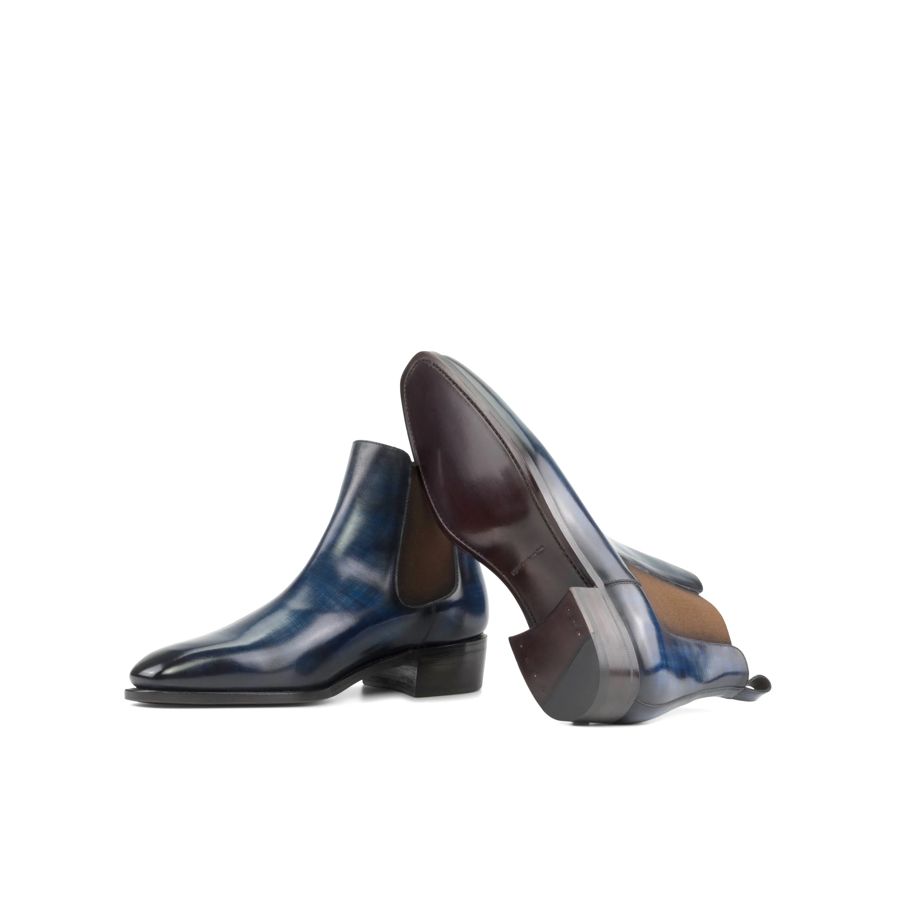 Pair of blue and brown leather Vino Patina Chelsea boots for stylish footwear choices