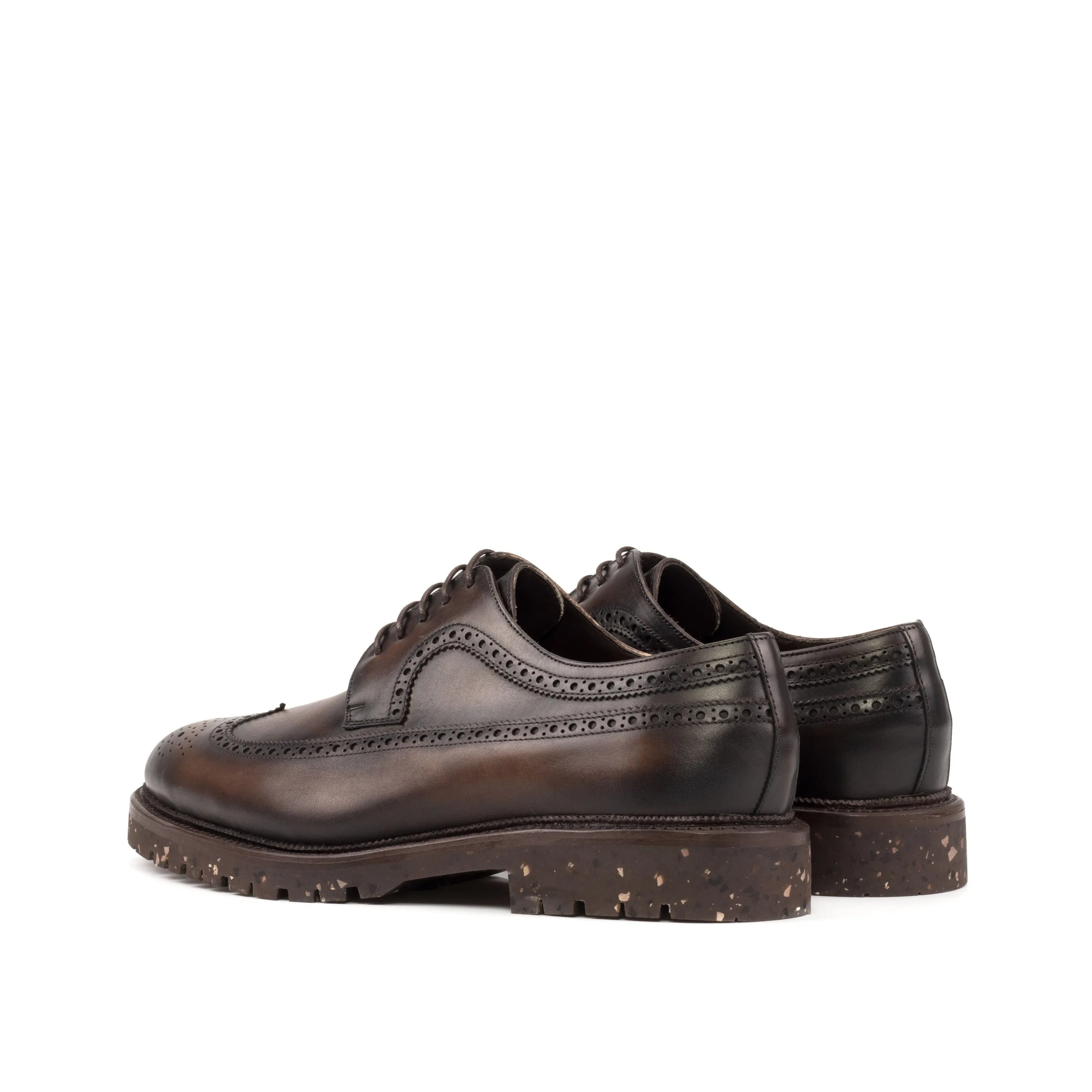 Brown leather brogue shoes in Vos Longwing Blucher II design showcasing elegance and style