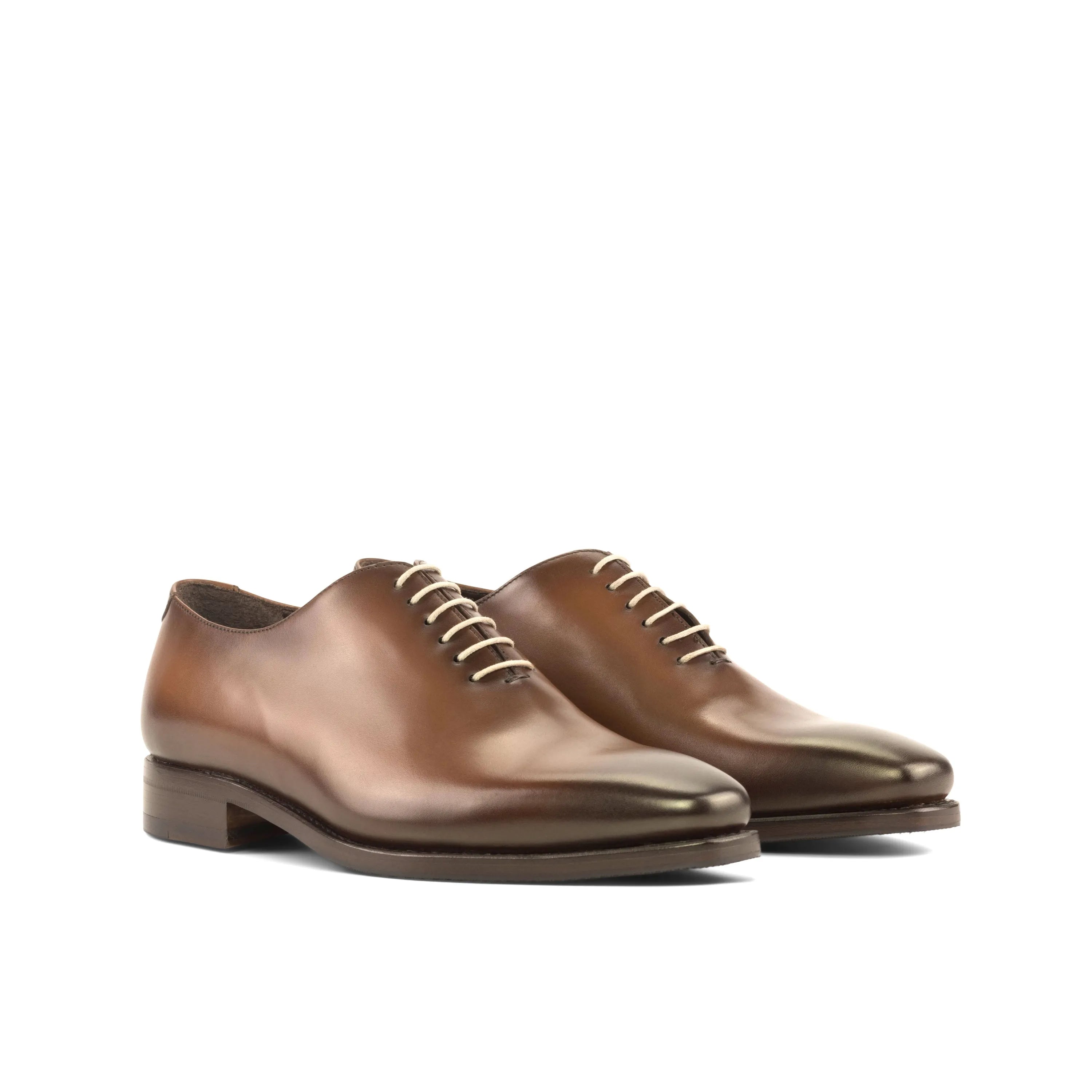 Brown leather Walker Wholecut shoes for elegant and sophisticated footwear choices