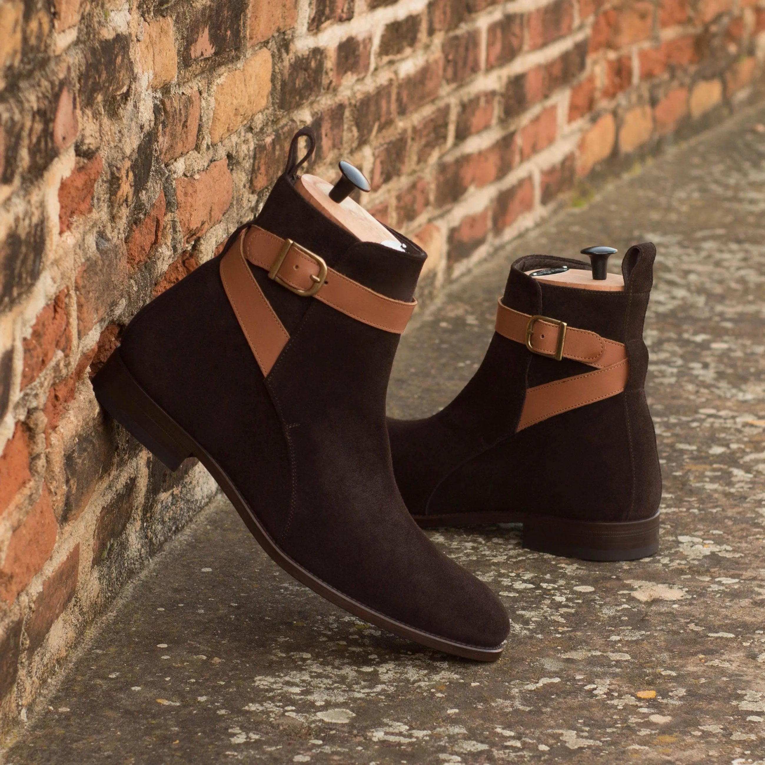 Pair of brown suede Wapasha Jodhpur Boots with tan leather straps