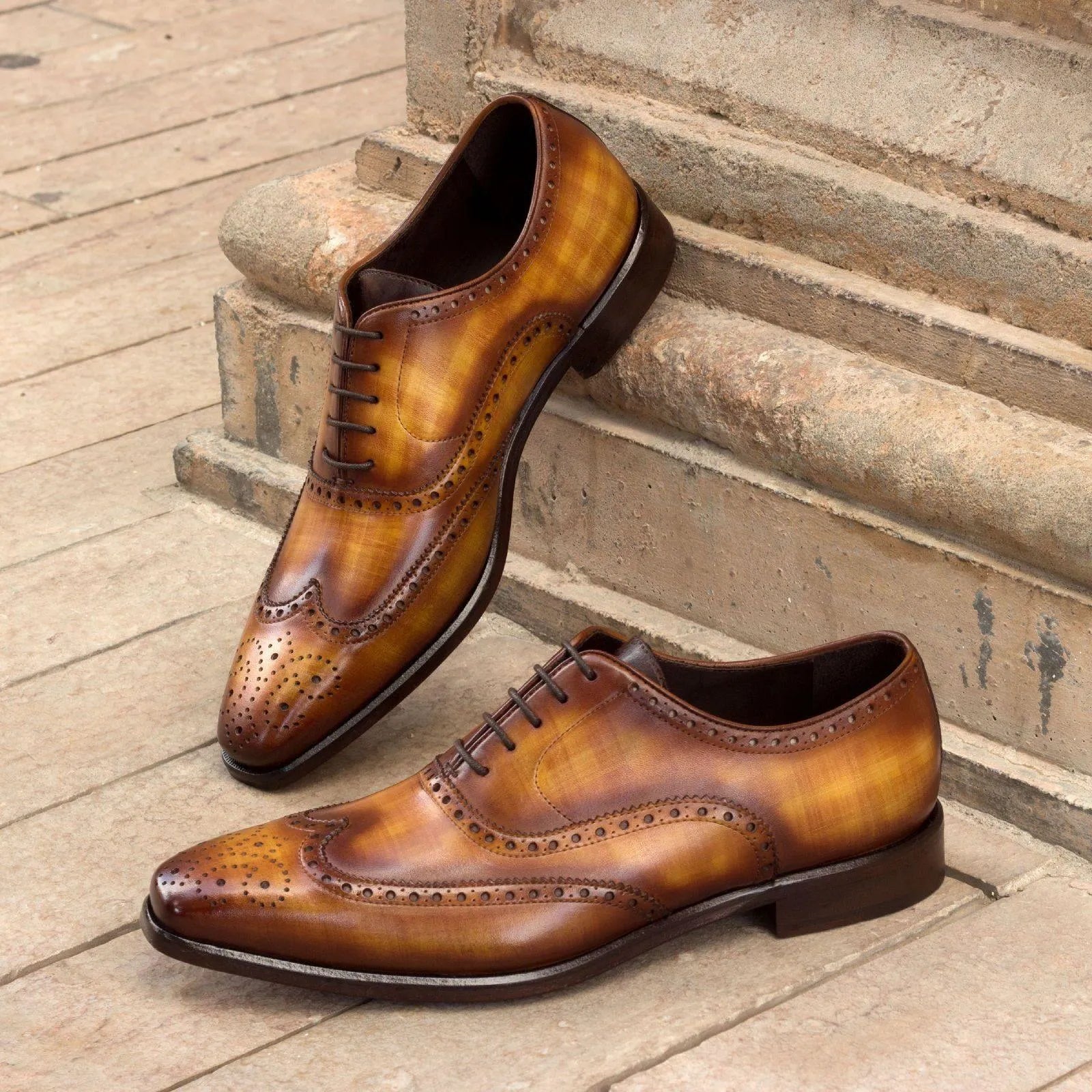 Brown leather Wingtip dress shoes, exemplifying Wardon Patina Brogue craftsmanship