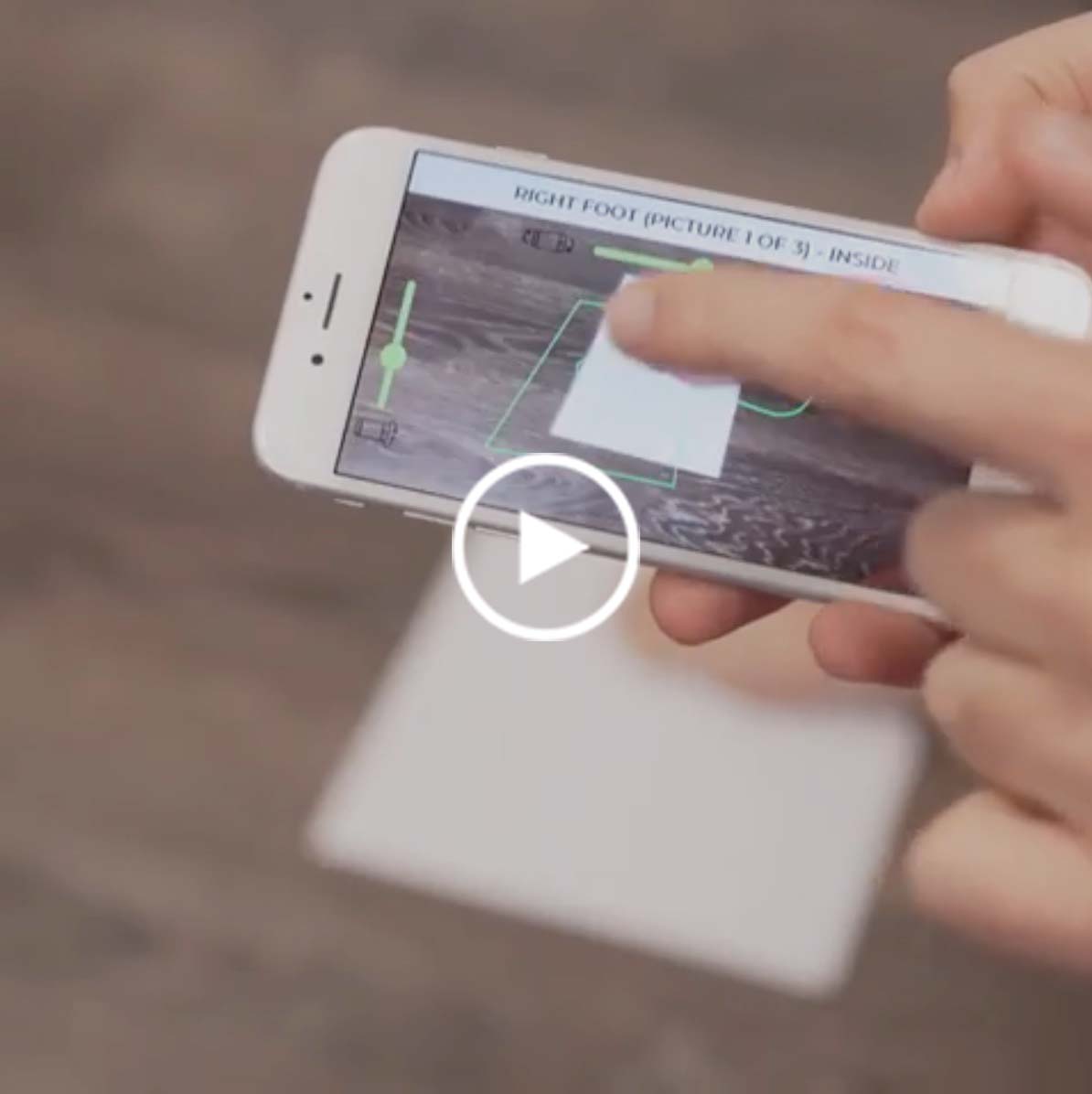 White smartphone showcasing a foot measurement application for custom shoe lasts.