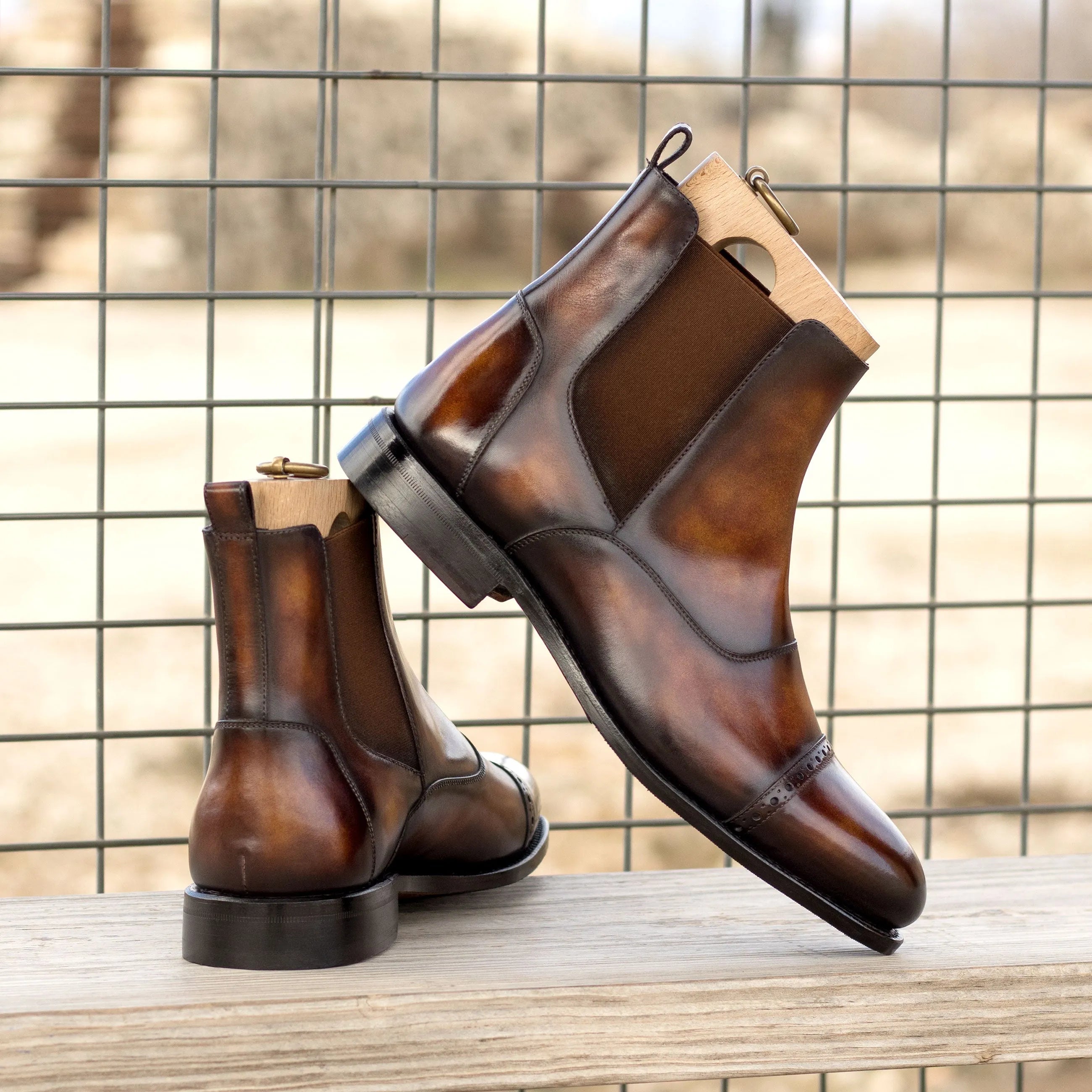 Pair of brown leather Willy Patina Chelsea boots for stylish footwear options