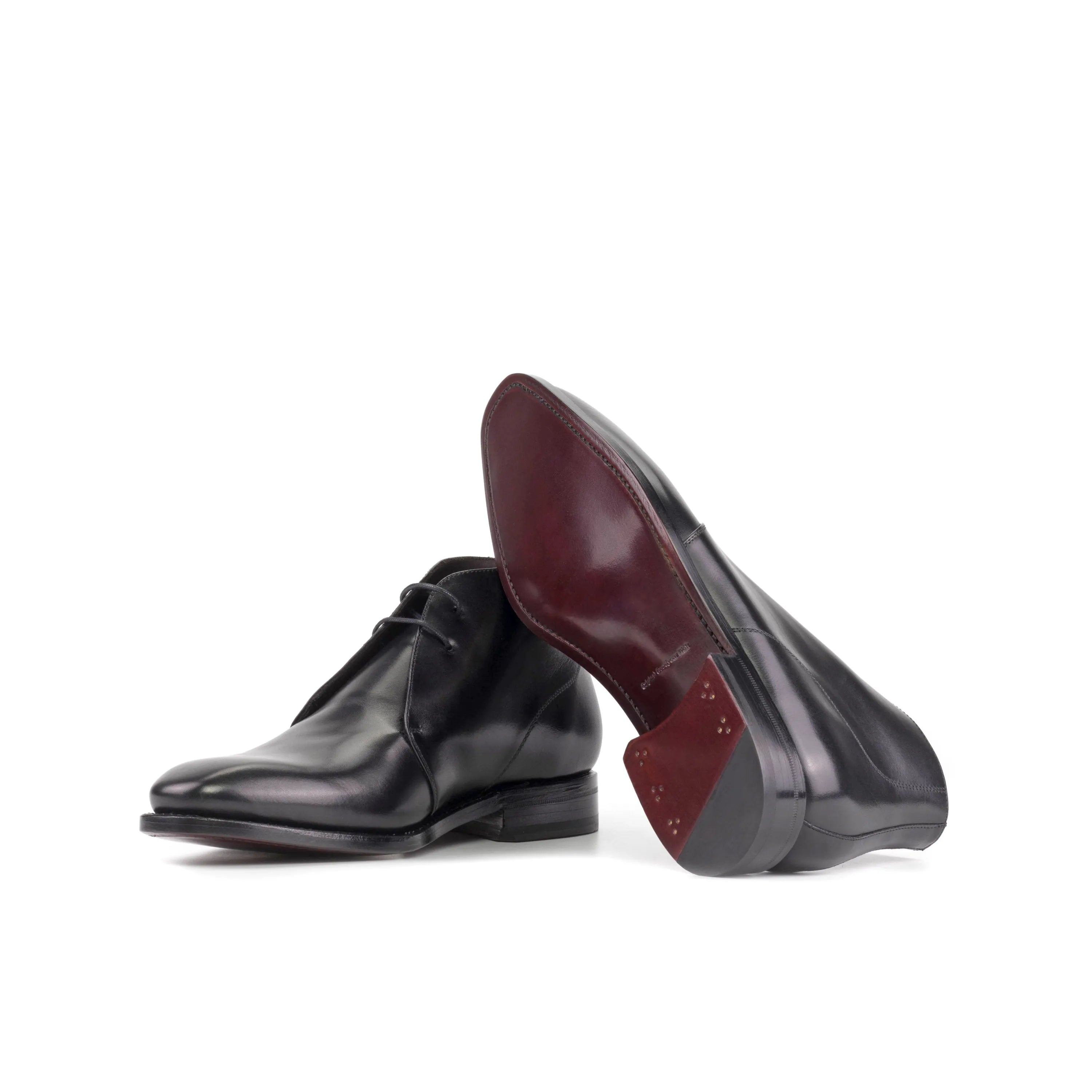 Pair of black leather Winsor Chukka boots for a sophisticated and stylish look