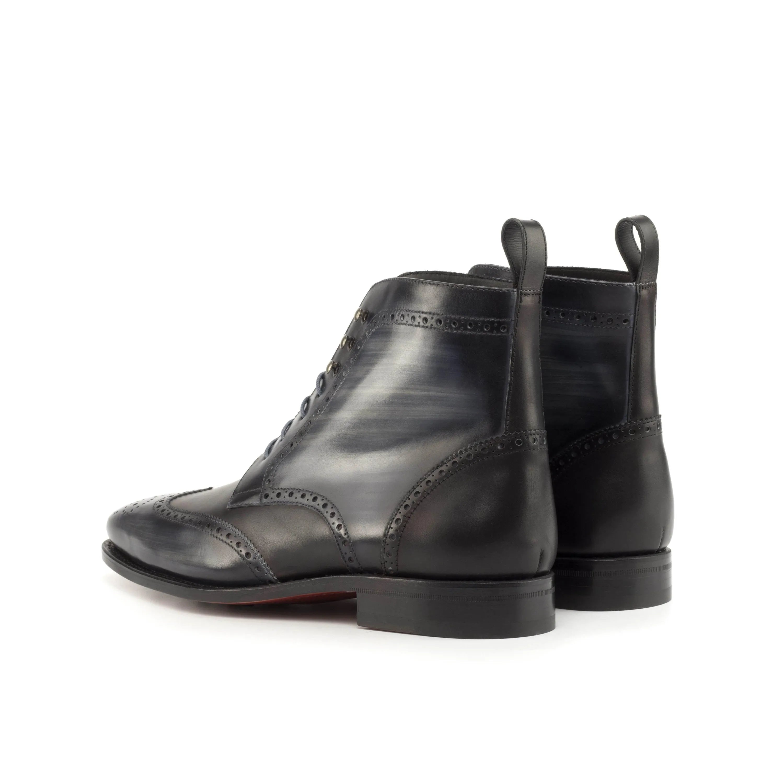 Black leather wingtip Zdan Military Brogue Patina Boots II showcasing elegant craftsmanship